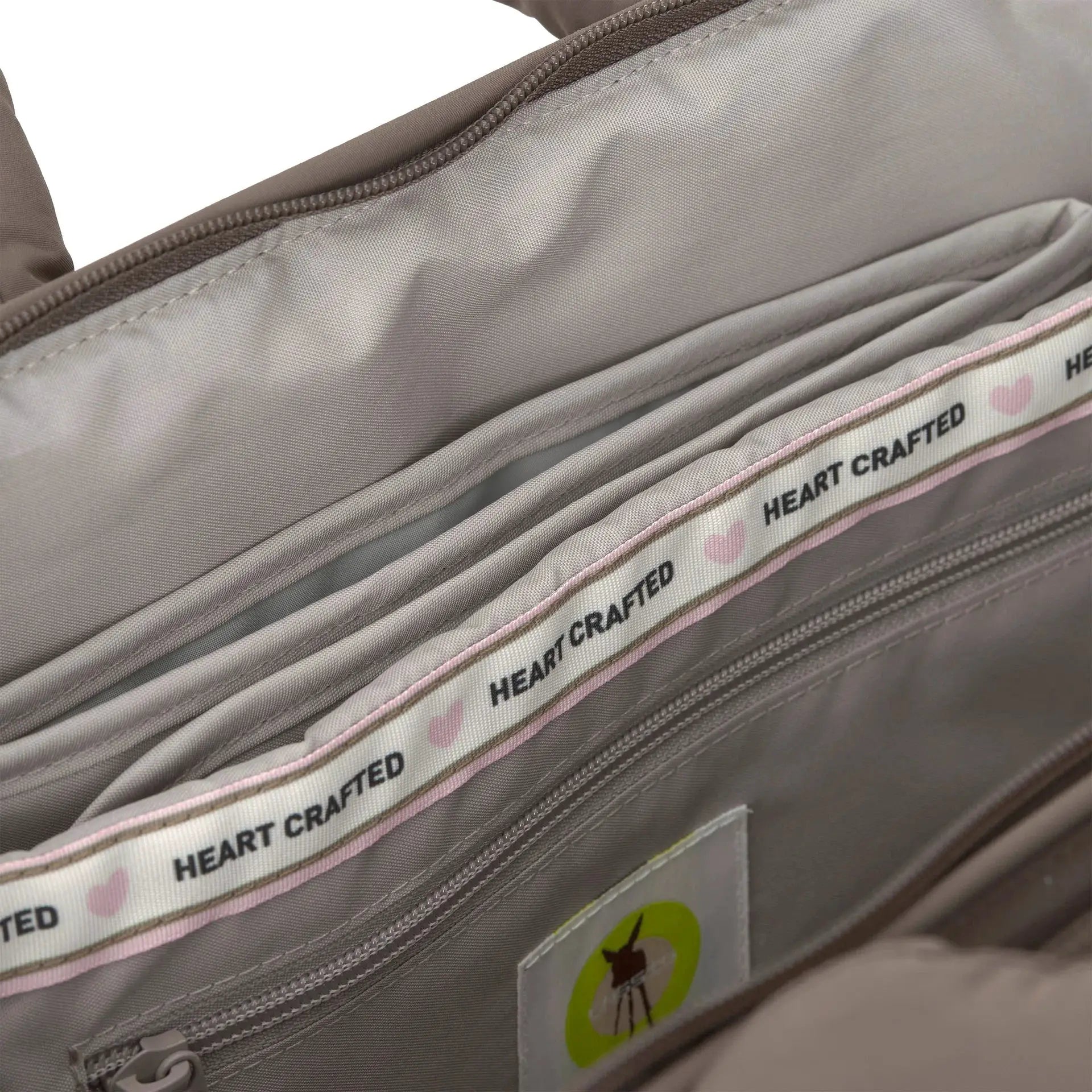 LÄSSIG Minoa diaper bag chocolate; grey interior with multiple zip pockets