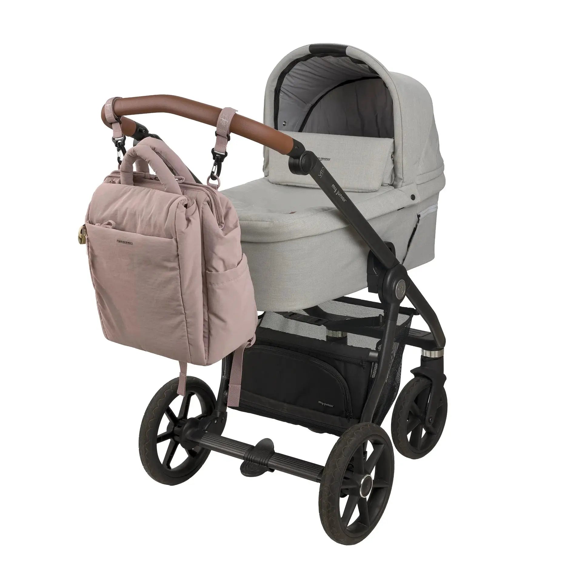 LÄSSIG minoa sac à langer rose poudre, diaper bag attached to a gray stroller handle