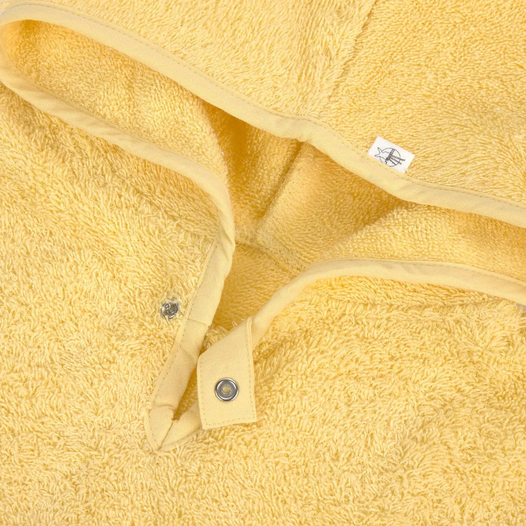 LÄSSIG poncho éponge / yellow by Citron Grenadine