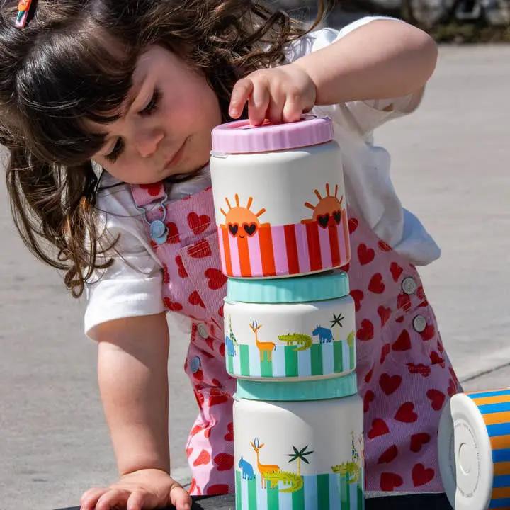 Thermos lunch jar set with pastel lids stacked by a child; Citron Grenadine Cotton Cloud design, 350ml
