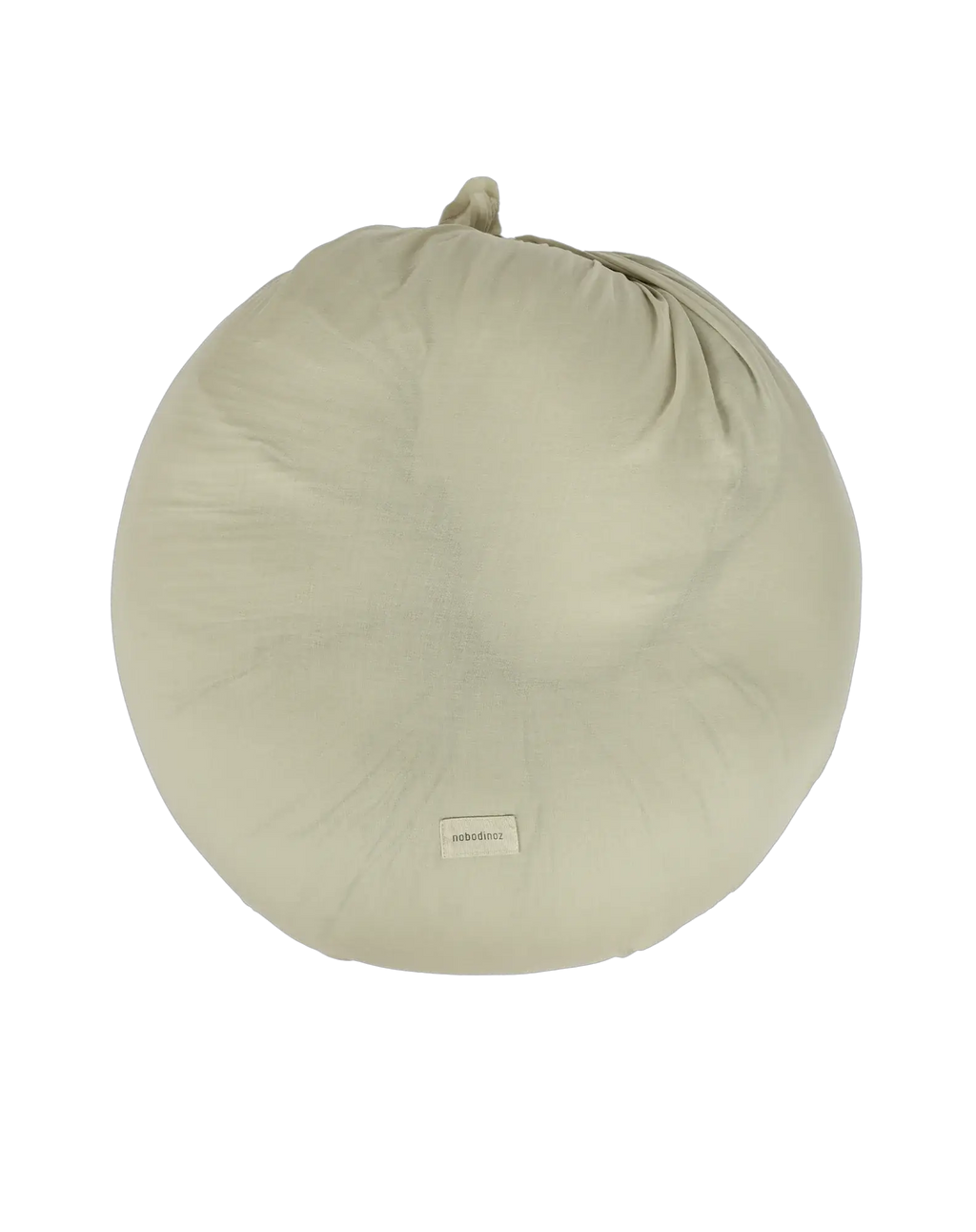 Coussin de maternité rond Nobodinoz vert matcha avec petit nœud et étiquette Nobodinoz
