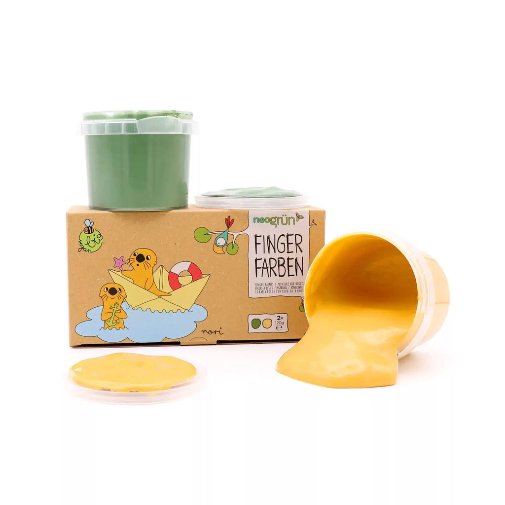 Finger paints vegan set by Neogrün/Citron Grenadine; green jar atop illustrated box with yellow paint spill.