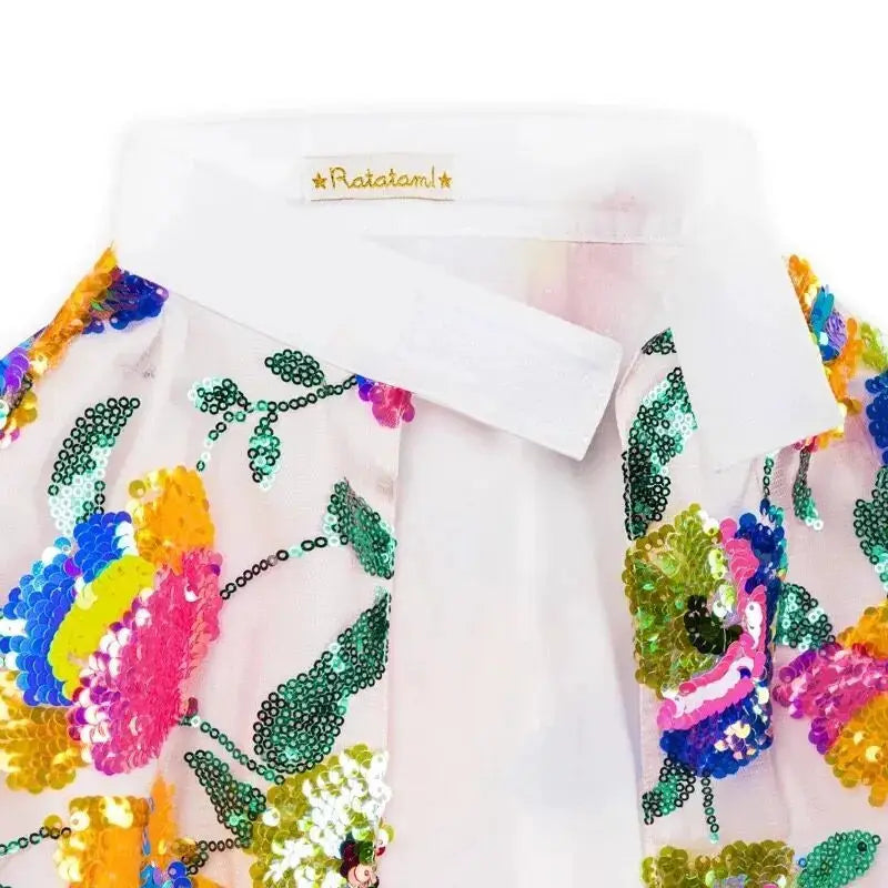 Ratatam cape paradis by Citron Grenadine, white cape with multicolor sequin floral embroidery