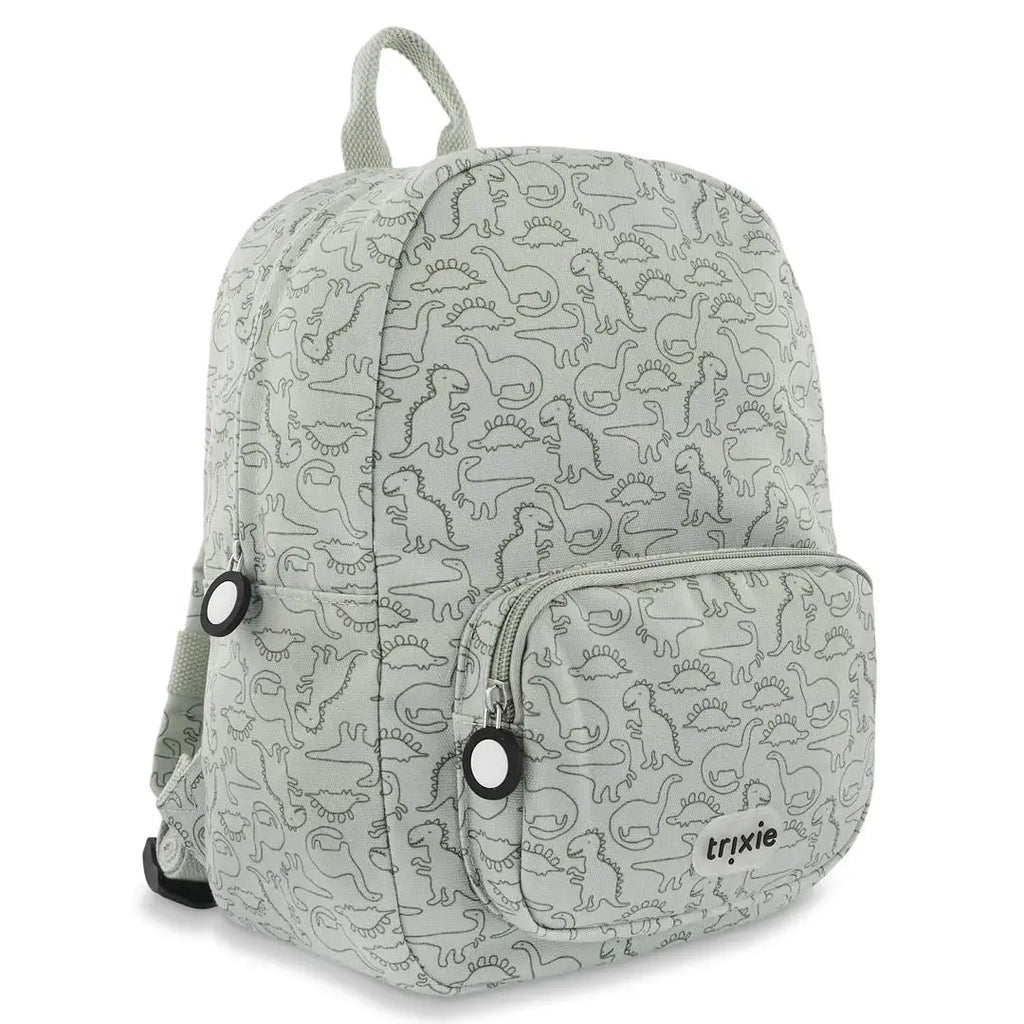 Sac à dos TRIXIE scolaire gris clair imprimé dinosaures, avec poche frontale.