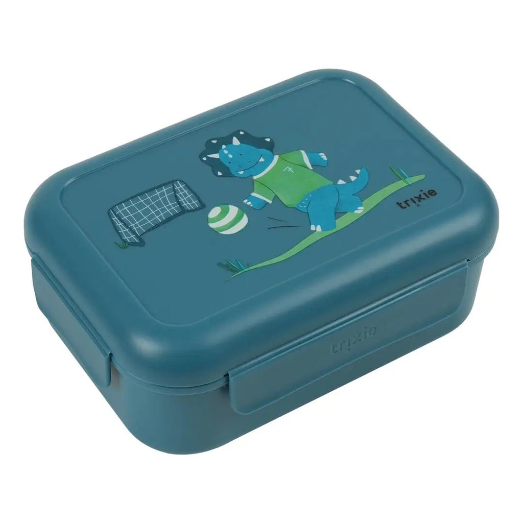 Trixie teal lunch box with clips featuring a blue Triceratops in a green jersey kicking a soccer ball beside a goal