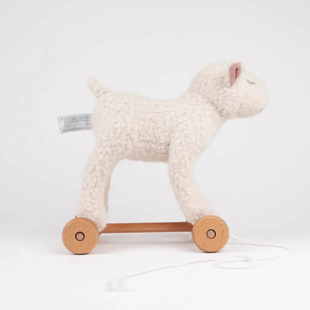 Mary pull-along plush sheep on wooden wheels, cream fur with pink ears; Citron Grenadine