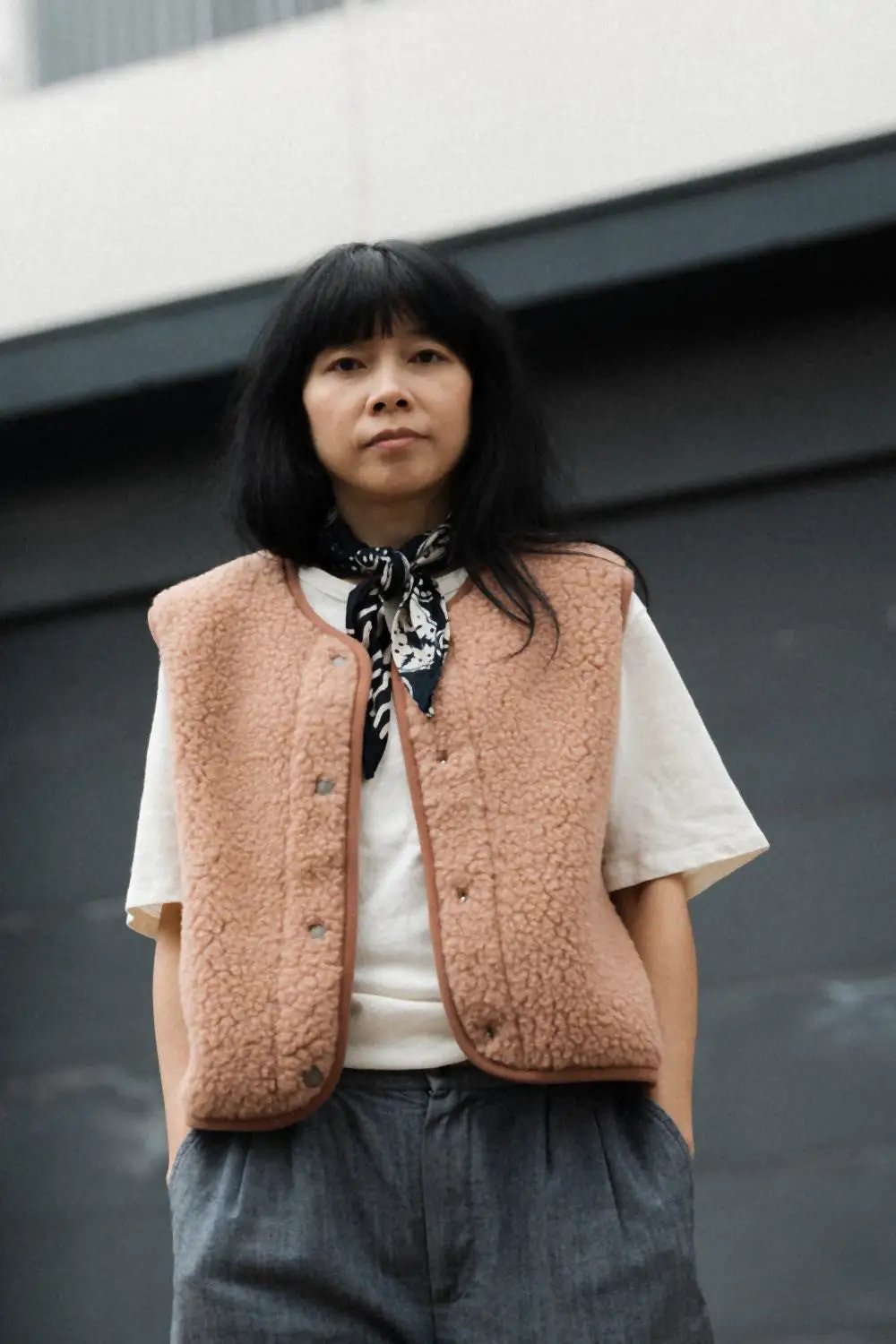 ALWERO teddy fleece bodywarmer TYB rugby tan worn over a white tee by a person with a black scarf