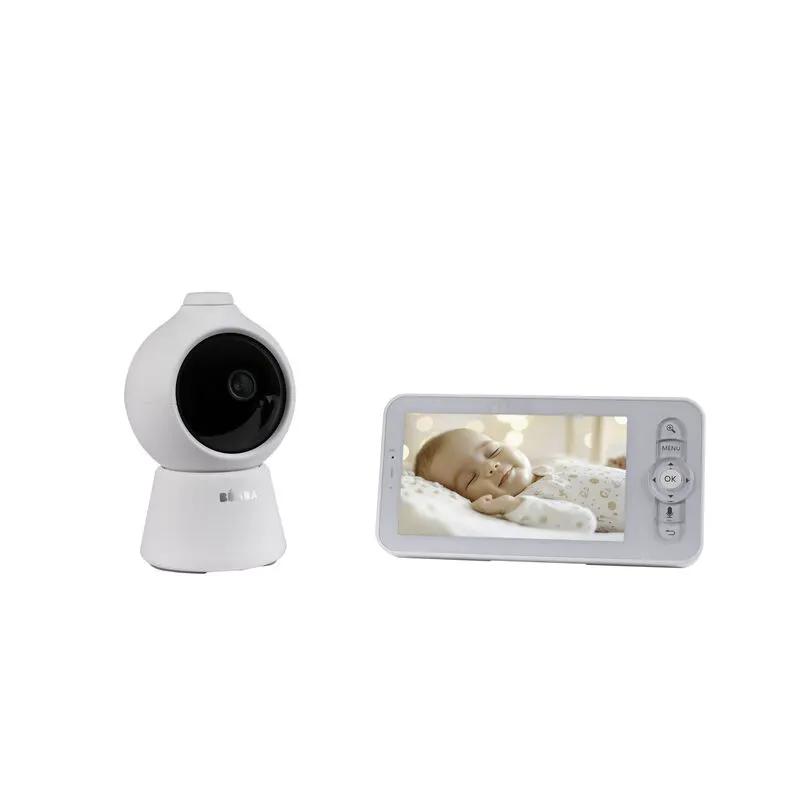 Écoute-bébés vidéo BÉABA zen smart AI blanc: caméra sphérique et moniteur portable affichant bébé