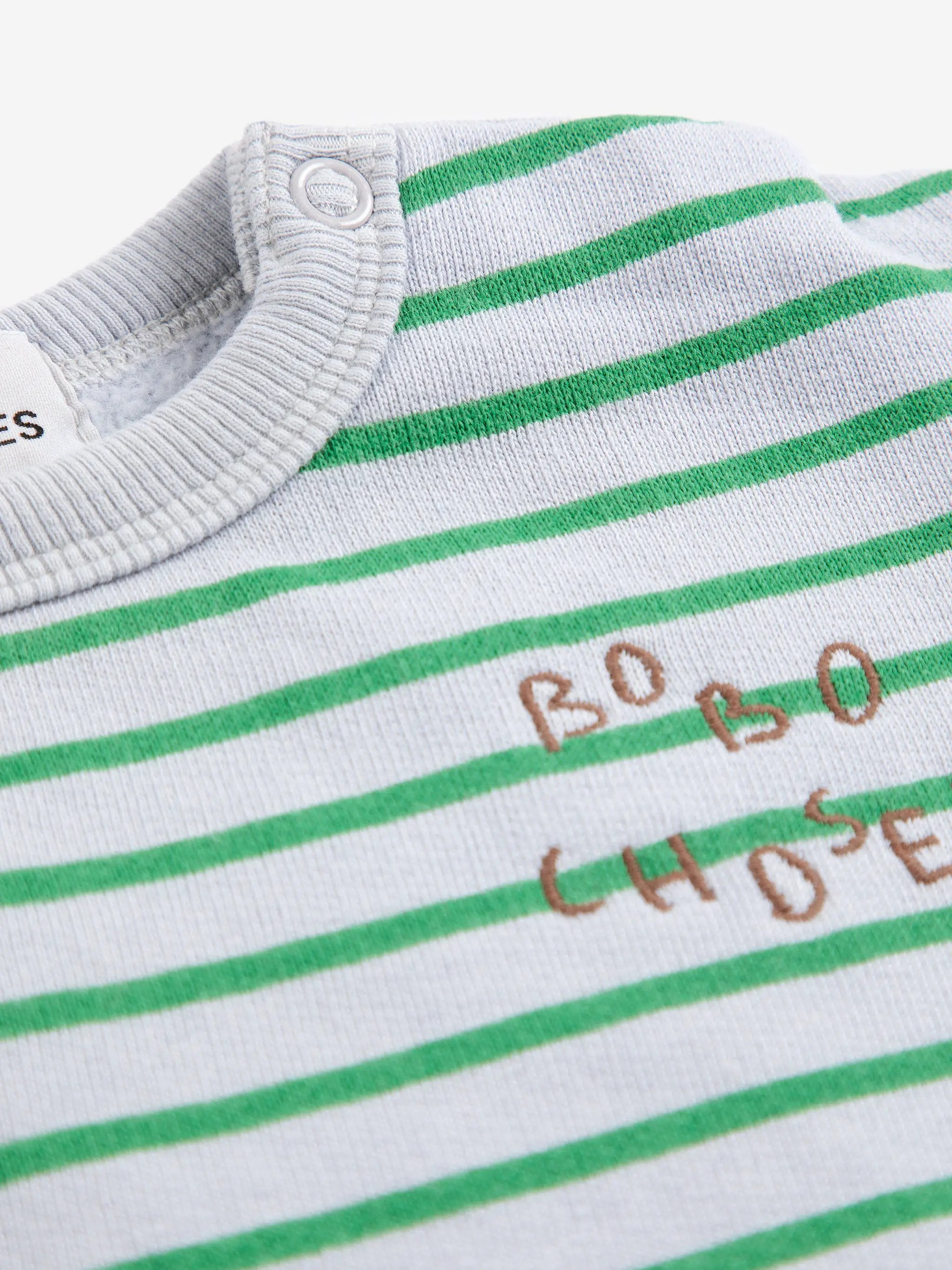 BOBO CHOSES striped sweatshirt in grey with green stripes; knit fabric, shoulder snap detail