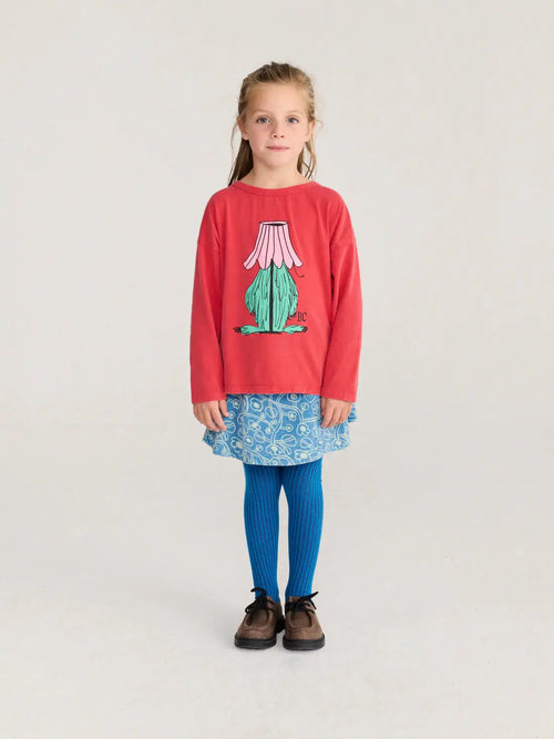 BOBO CHOSES hidden monster t-shirt in red, long-sleeve with pink-and-green graphic, worn by a young girl.