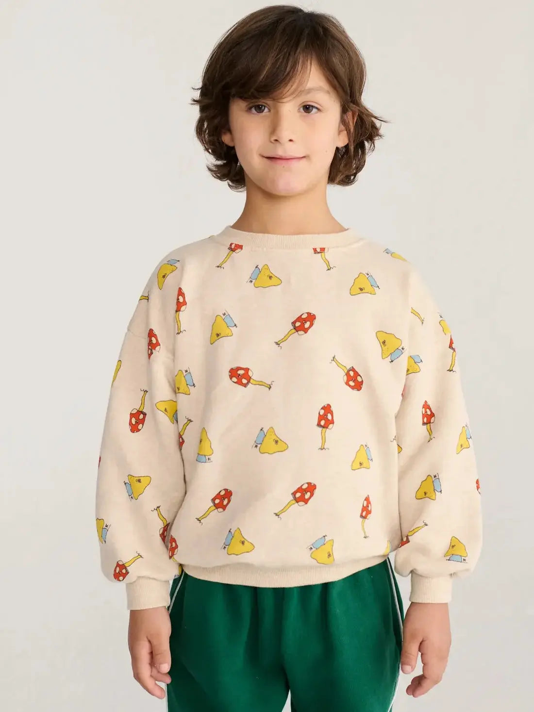 BOBO CHOSES Mush Monster Duo sweatshirt, beige with an all-over print of red mushrooms and yellow triangles.