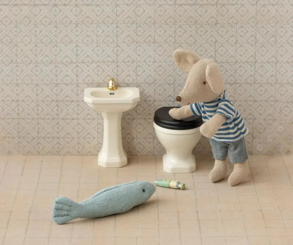 Maileg off-white dollhouse sink in miniature bathroom scene with toilet