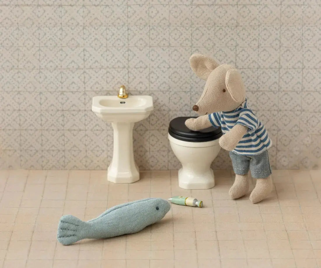 Maileg off-white dollhouse sink in miniature bathroom scene with toilet