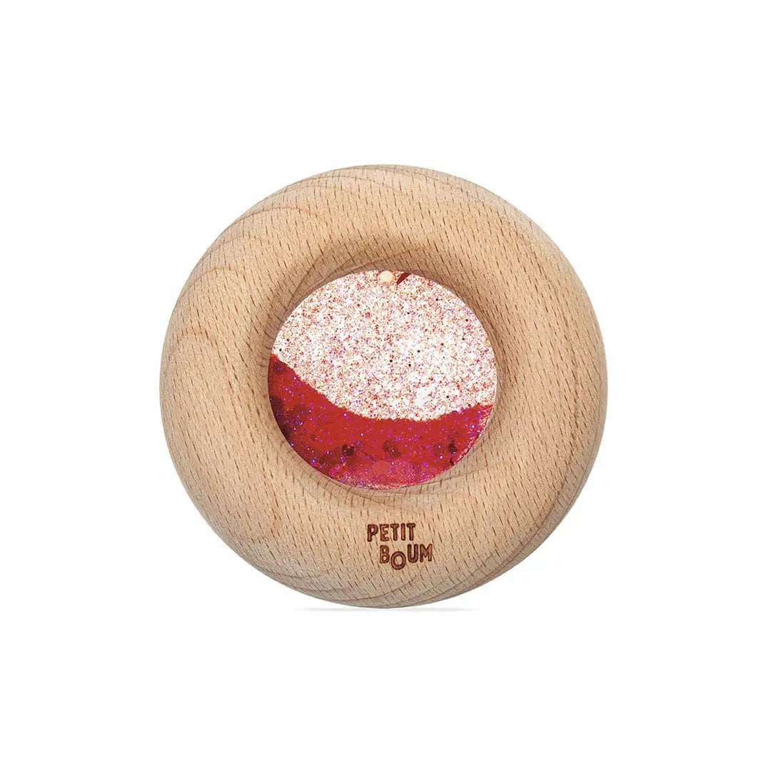 Petit Boum donut sensory teething toy, natural wood with red sparkly center