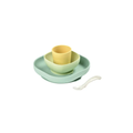 BÉABA four-piece silicone meal set in yellow and mint green with a spoon