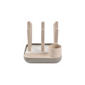 BÉABA bottle-drying rack with four beige supports, Terre d'argile tones, and cup holder