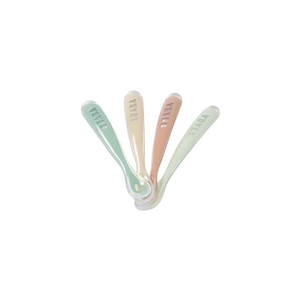 4-pack BÉABA silicone first-age spoons in pastel mint, beige, peach and pale green