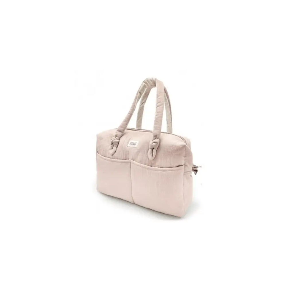 Sophie diaper bag by Citron Grenadine in feel blush pink with dual top handles and front pockets.