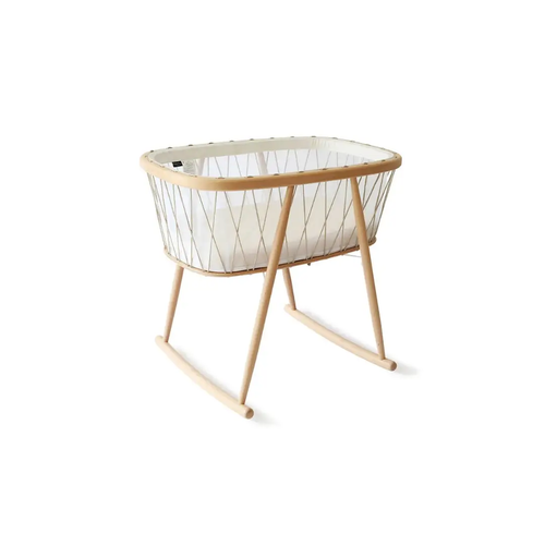 Charlie Crane KUMI desert bassinet with wooden rocking frame and white fabric lining