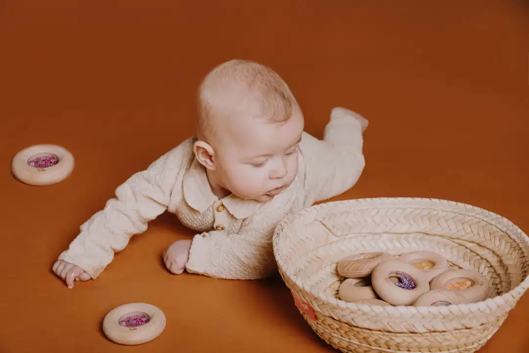 Petit Boum donut sensoriel lemons, wooden teething toy with colorful centers