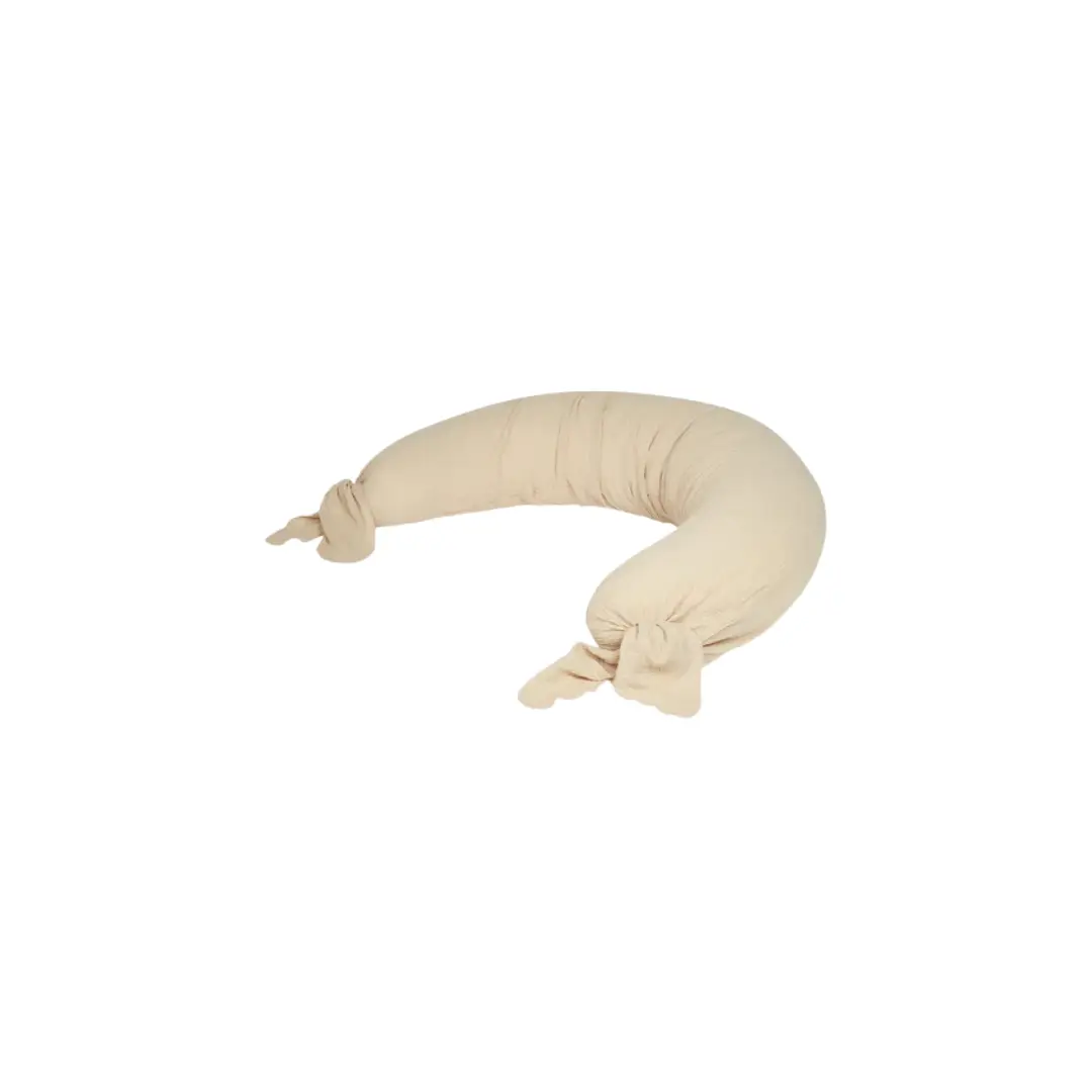 Nobodinoz nursing maternity pillow wabi sabi ginger, curved beige fabric with knotted ends