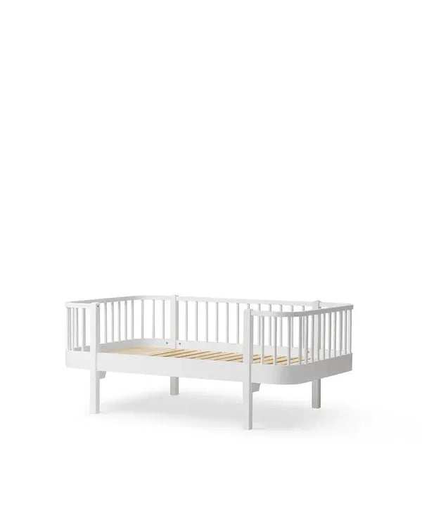 Oliver Furniture white wooden junior banquette bed with side rails.
