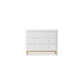Dresser with white finish, three drawers, and natural oak legs.