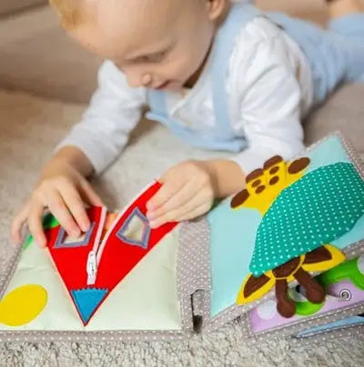 JOLLY DESIGNS livre d'éveil en tissu; bébé explore le perroquet coloré