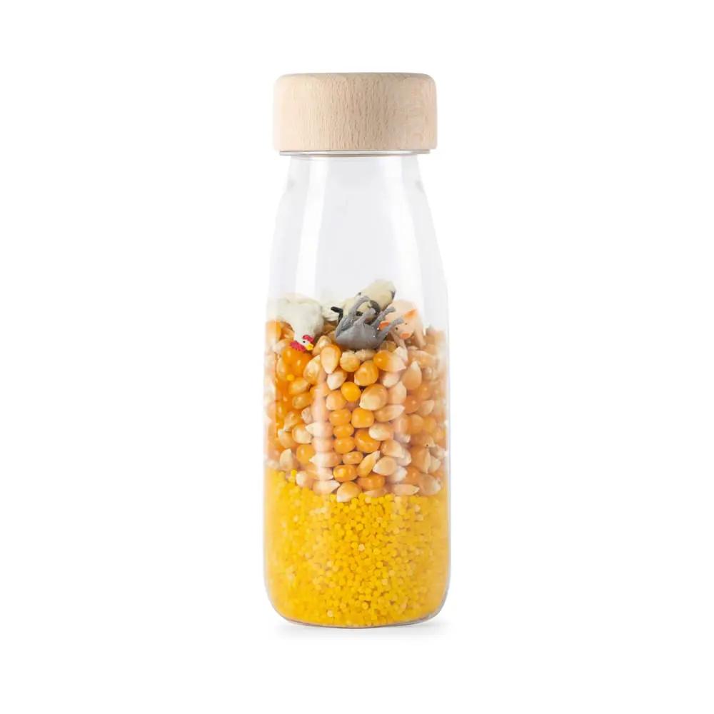 PETIT BOUM bouteille sensorielle farm, Citron Grenadine, verre transparent avec bouchon en bois et perles jaunes