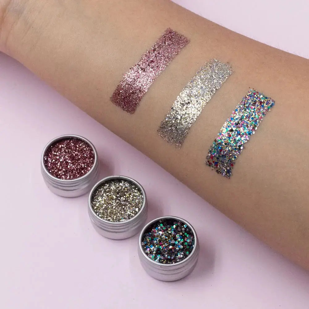 Si Si la paillette kit 3 iconique by Citron Grenadine; 3 glitter swatches on arm (rose pink, silver, multicolor) with 3 jars