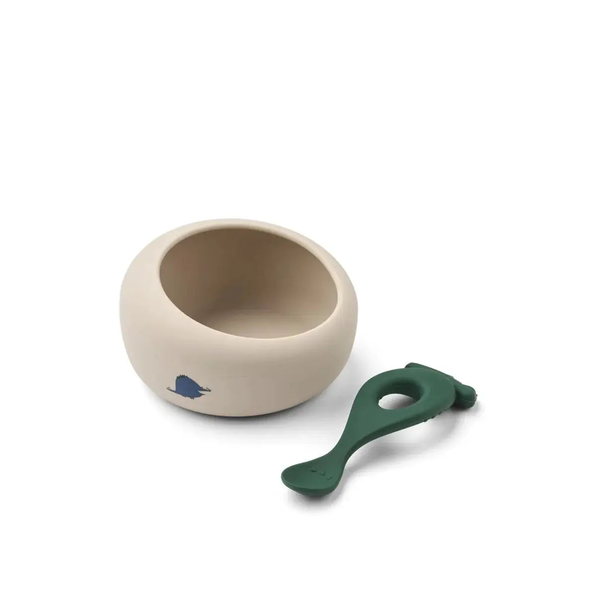 LIEWOOD bowl and spoon set, sandy beige with blue dinosaur accent and green spoon.
