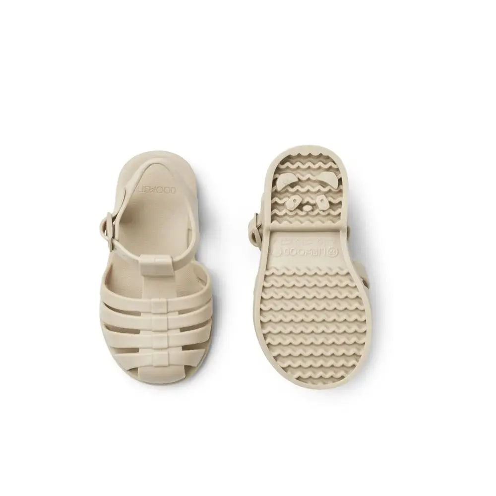 LIEWOOD baby sandals sandy beige; jelly-style sandals with adjustable strap, pair shown.
