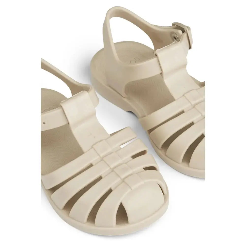 Pair of sandy beige LIEWOOD baby sandals with multiple front straps and back strap