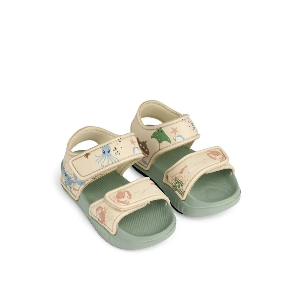LIEWOOD baby sandals pair with sea creature prints, beige straps and green soles