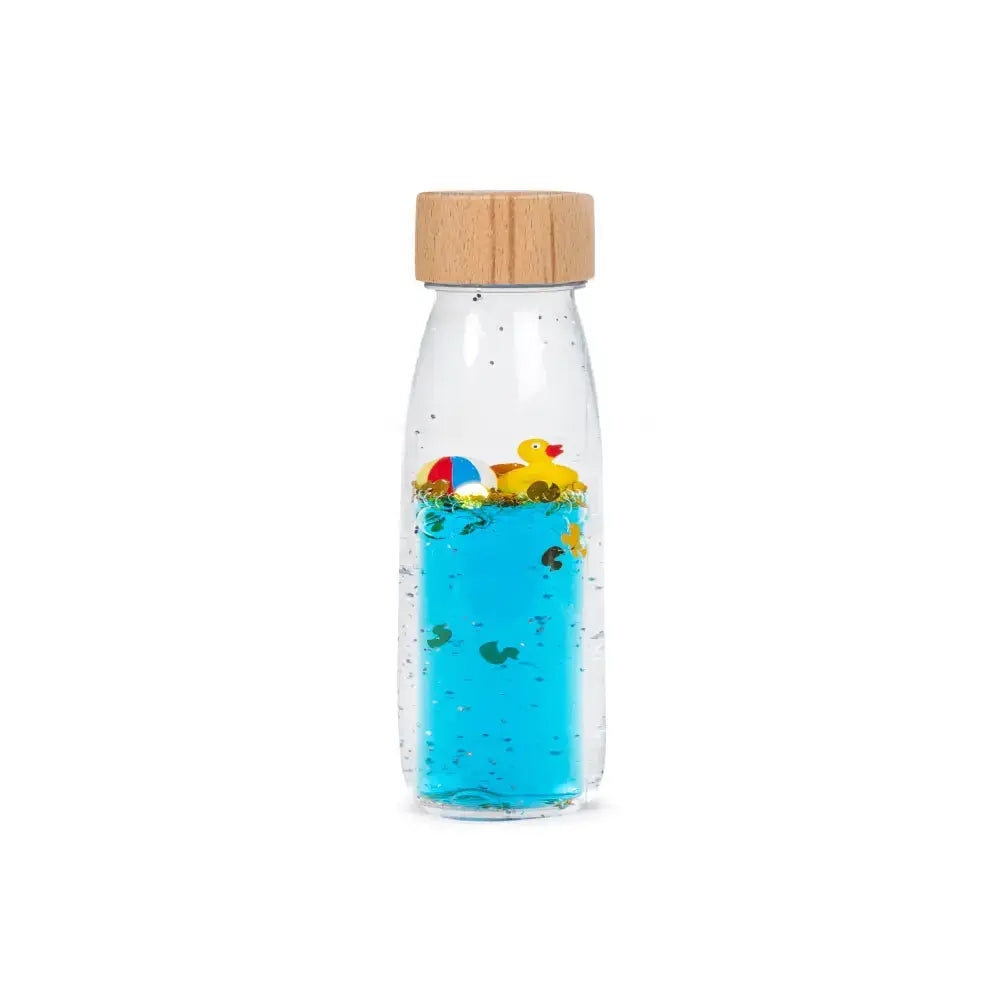 PETIT BOUM bouteille sensorielle move bottle ducky - bouteille transparente, liquide bleu, canard jaune, bouchon en bois