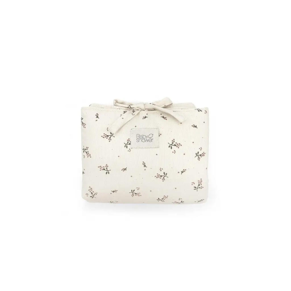 Audrey nomade changing mat in roseberry canvas, cream fabric with tiny floral print by Citron Grenadine