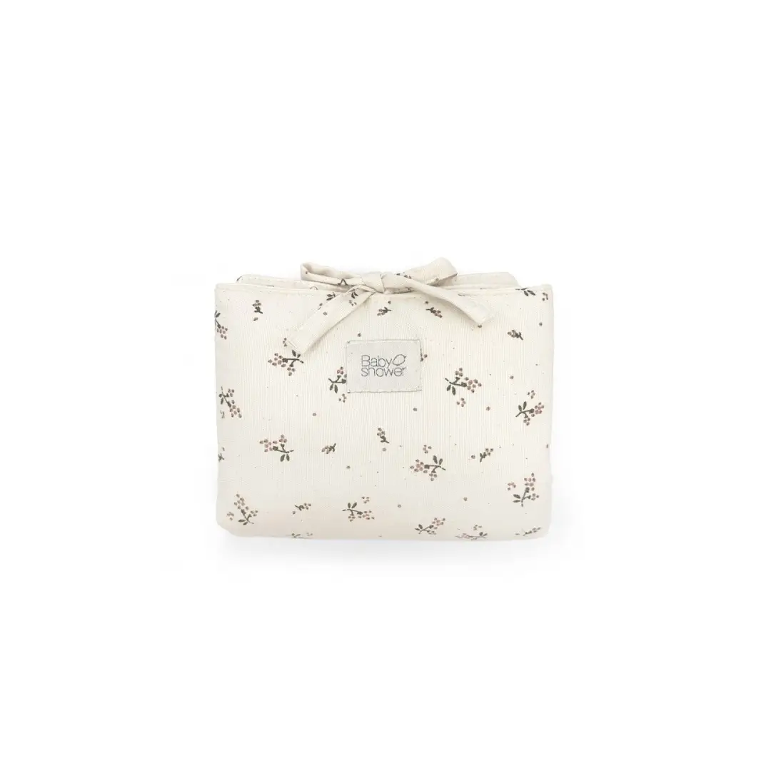 Audrey nomade changing mat in roseberry canvas, cream fabric with tiny floral print by Citron Grenadine