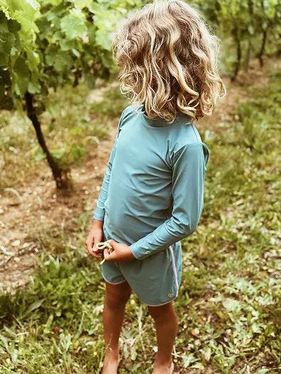 BAÏNES papaya anti-UV rash guard in teal by Citron Grenadine