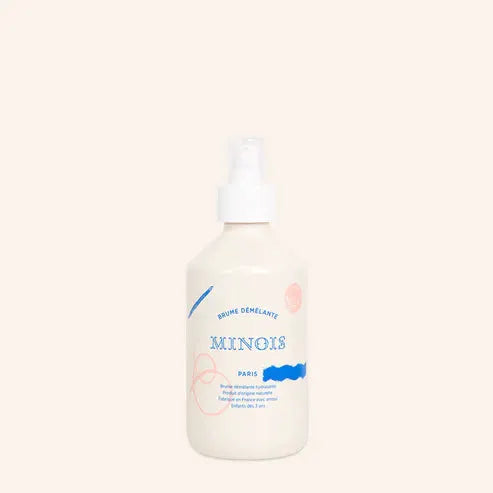 MINOIS brume démêlante spray bottle, Citron Grenadine brand, cream-colored hair styling product