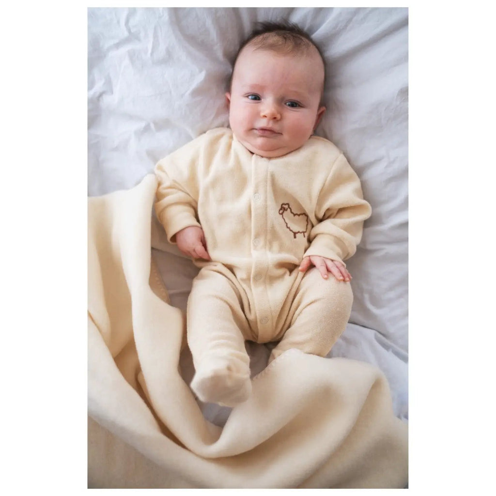 Pyjama en laine naturel pour bébé, beige avec petite broderie poulet sur la poitrine
