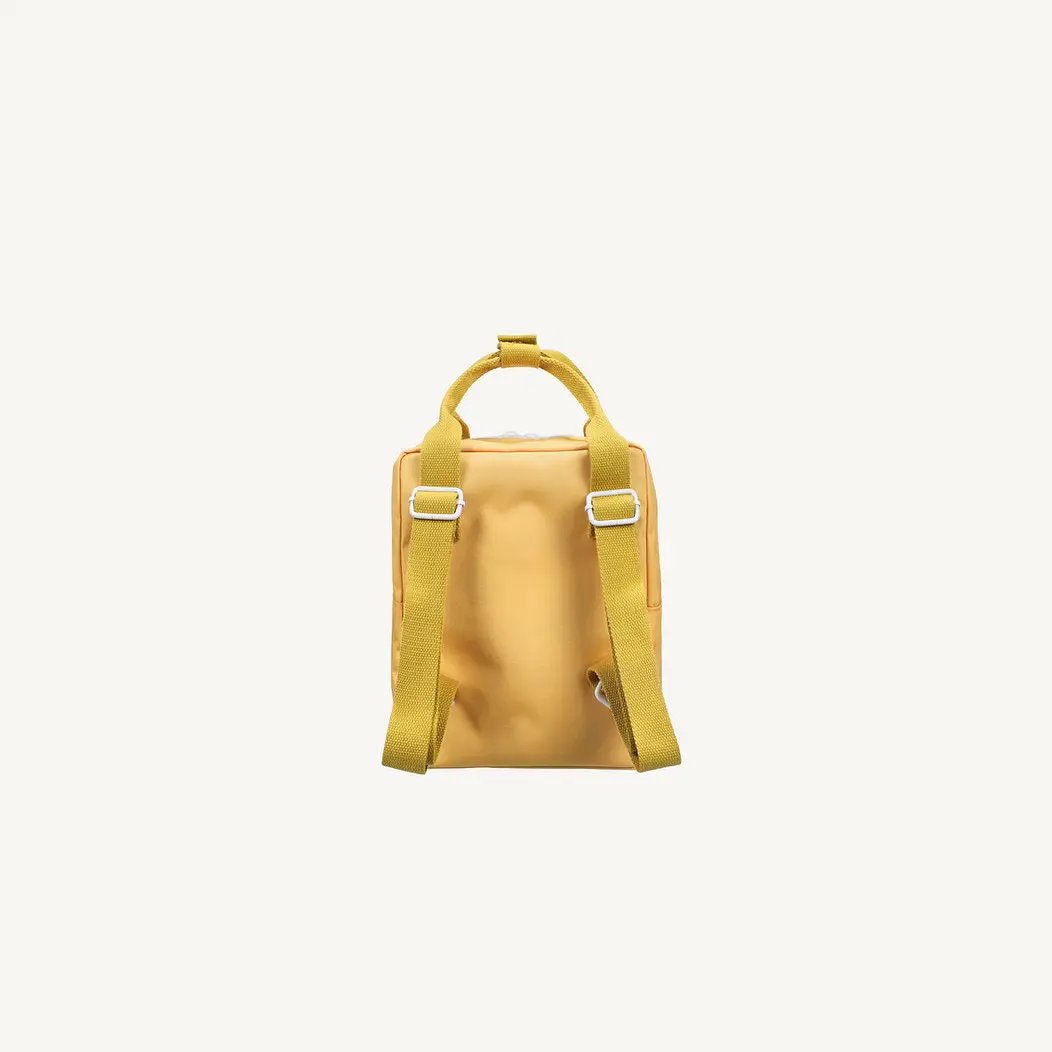 Sac à dos scolaire jaune Sticky Lemon par Citron Grenadine, bretelles réglables et poignée supérieure