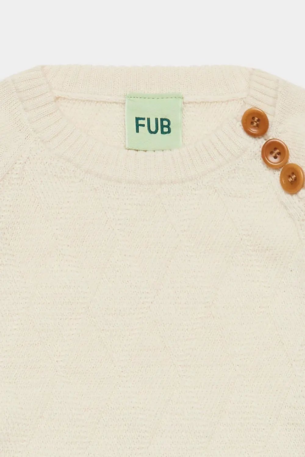 FUB pull arlequin en mérinos écru avec 3 boutons bruns sur l'épaule