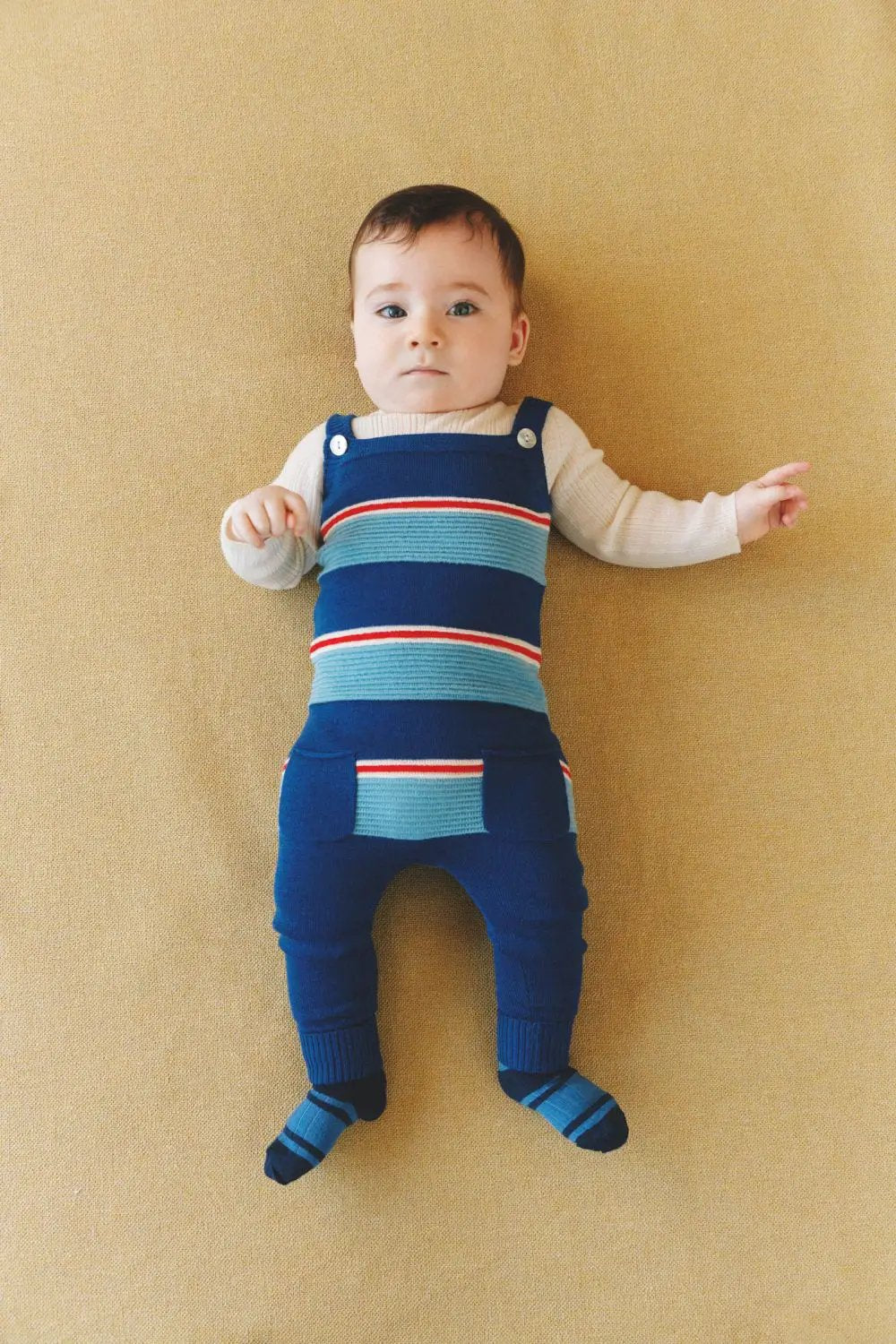 FUB ribbed Merino baby body by Citron Grenadine; navy with light blue stripes and red trim, shoulder button straps