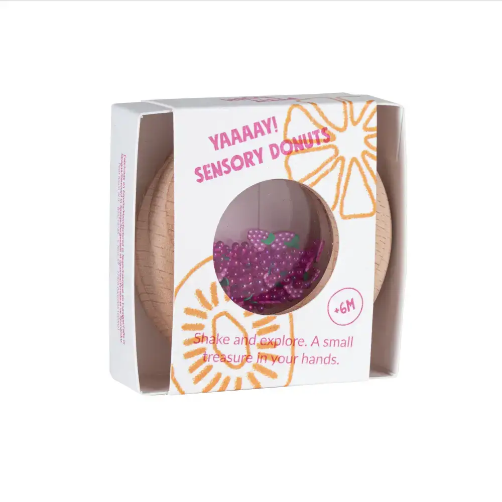 Petit Boum donut sensoriel – jouet de dentition Citron Grenadine, perles violettes visibles à travers la fenêtre