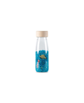 Petit Boum sensory bottle spy bottle sea; glass bottle with wooden cap, blue gravel, and tiny sea charms.