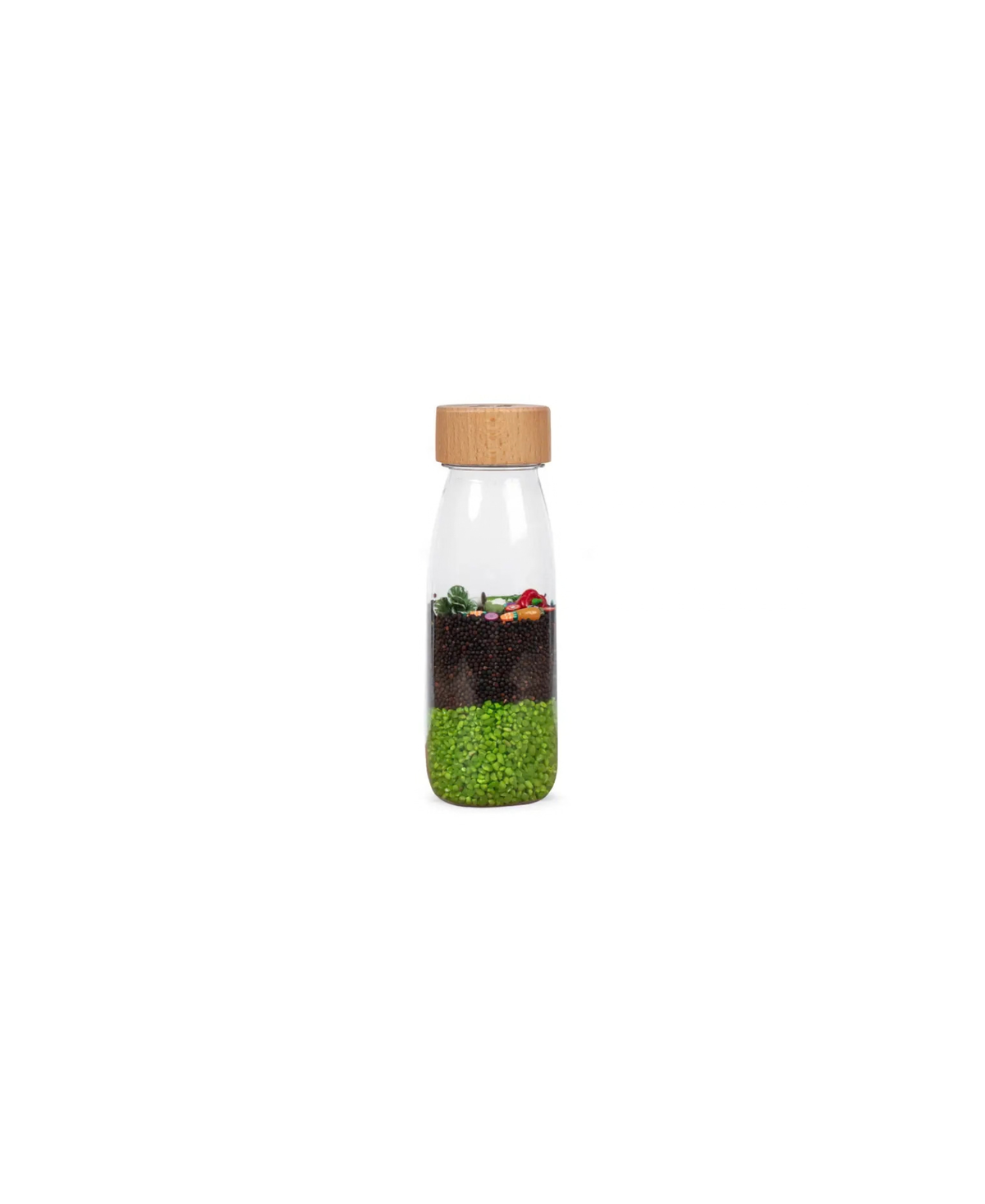 PETIT BOUM bouteille sensorielle en verre avec bouchon en bois; couches de billes vertes et brunes visibles.