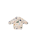 Bavoir LIEWOOD Merle dino roar sandy, beige long-sleeve smock bib with dinosaur prints