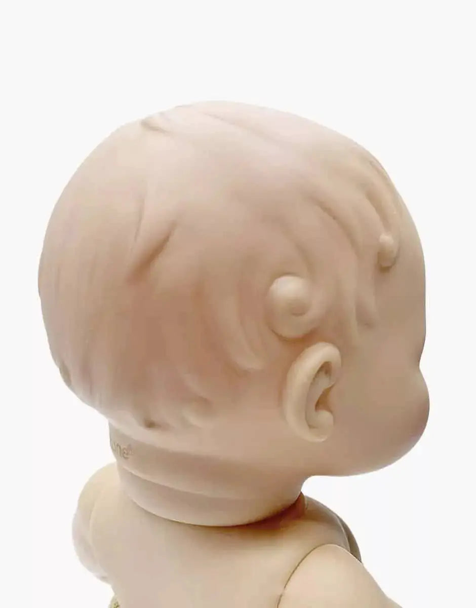MINIKANE Faustine doll head and shoulders, light skin tone, side profile