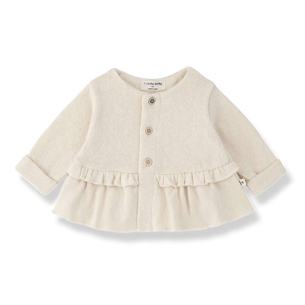 Citron Grenadine 1+ in the Family Strasbourg gilet écru; sleeveless vest with button front and tiered ruffle hem.