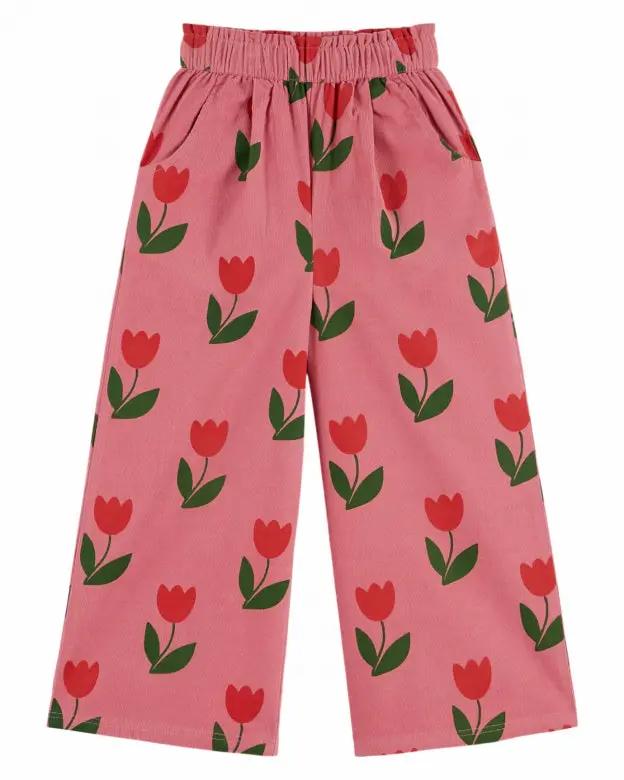 Pantalon velours EMILE ET IDA, grande tulipe, rose avec tulipes rouges et feuilles vertes par Citron Grenadine